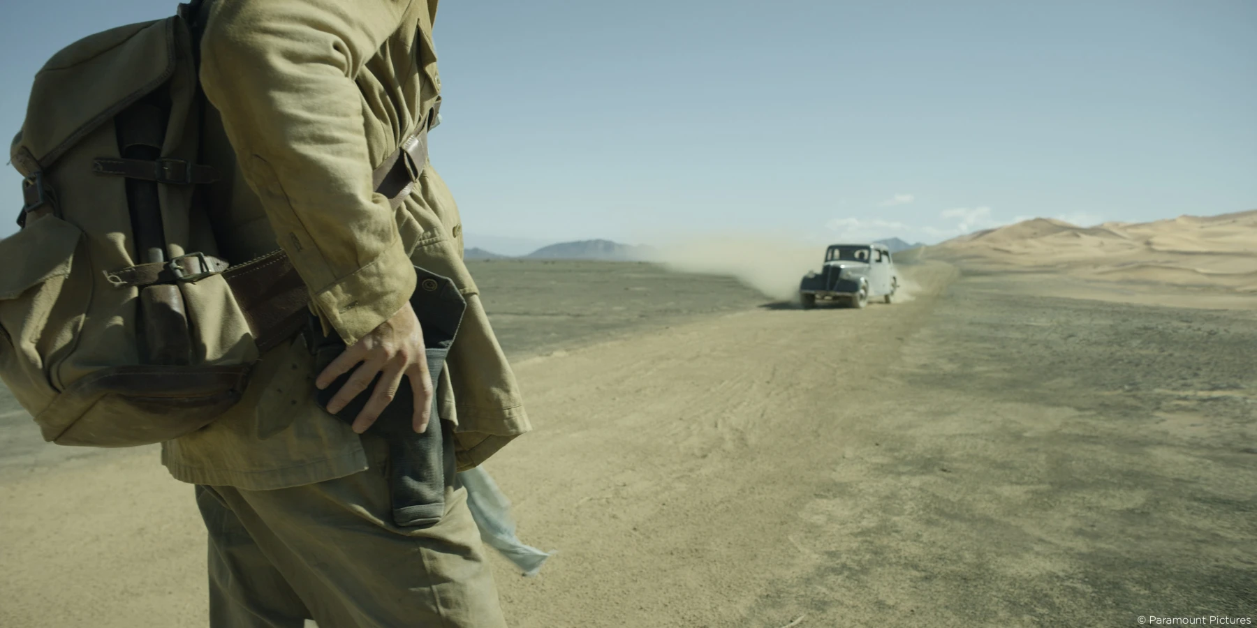 Man and a car coming in desert shot from Raynault vfx