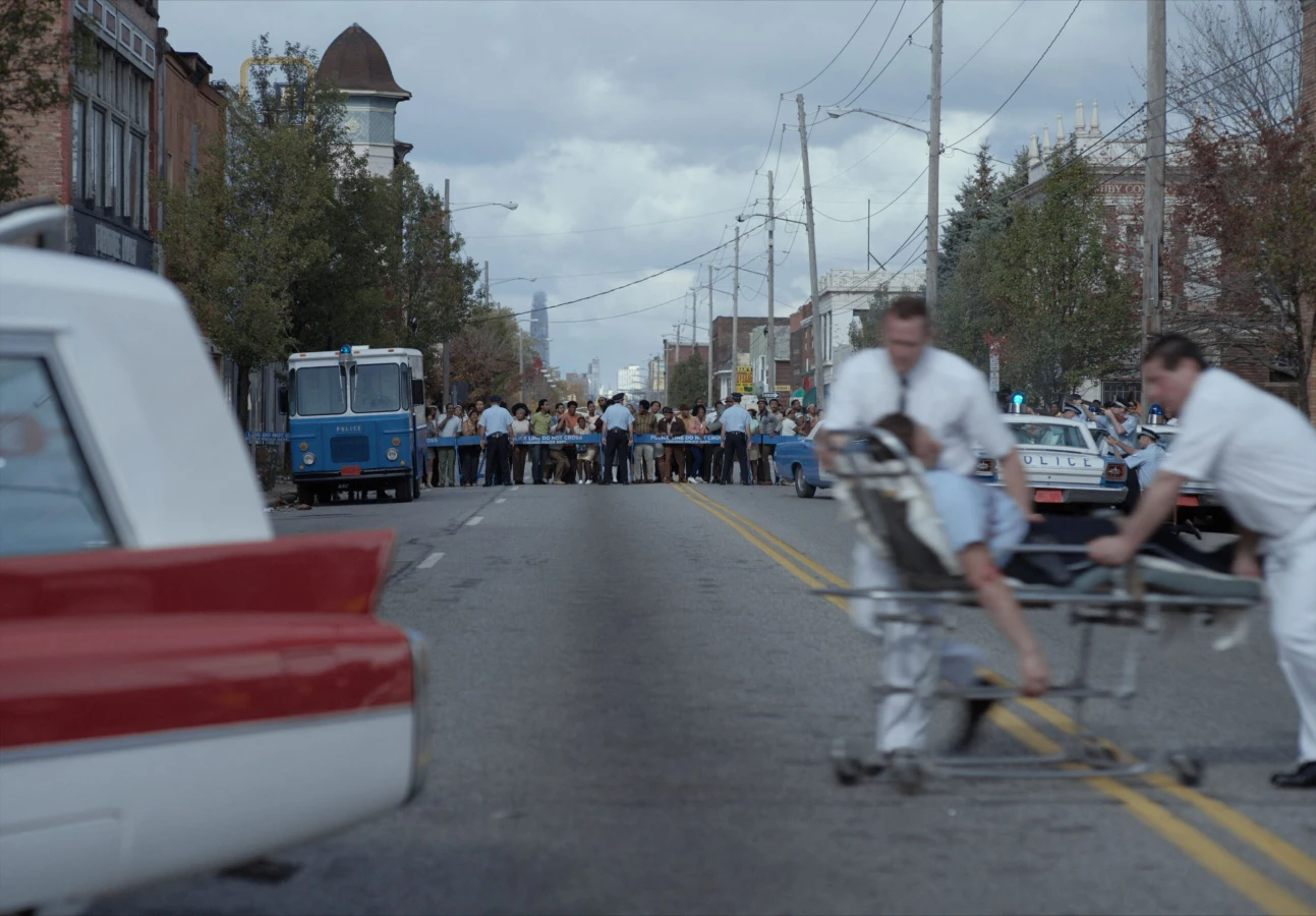 Judas and the Black Messiah men running with an injured person on a stretcher from Raynault vfx 